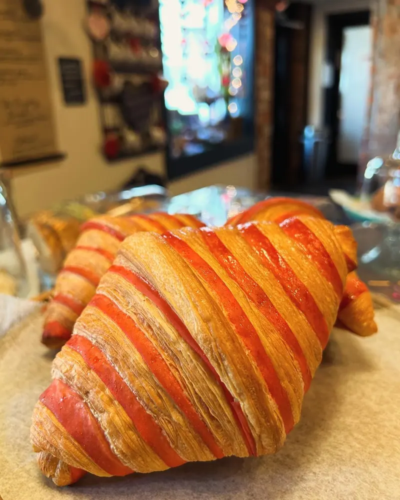 A bi-color croissant with striped pastry